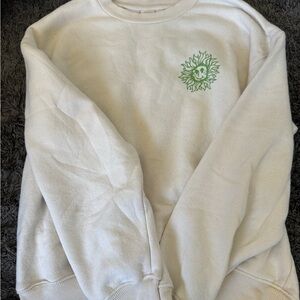 Urban Outfitters White Crew Neck Sweater with Green Sun Design